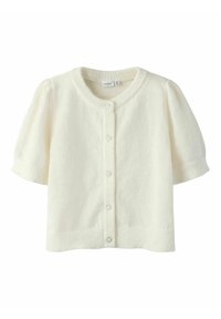 Cardigan blanc en tricot à manches courtes avec col rond et cinq boutons décoratifs en forme de fleurs sur le devant.