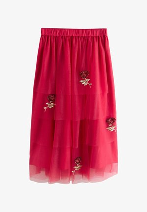 Jasne červená vrstvená sukňa s elastickým pásom, zdobená štyrmi flitrovými aplikáciami ruží roztrúsenými po látke.