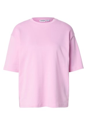 Rozā īsā piedurkņu T-krekls no mīkstas kokvilnas ar apaļu kakla izgriezumu un brīvu piegriezumu, gludu faktūru un bez redzamām rakstu zīmēm.