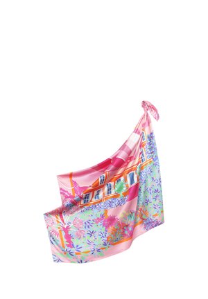 Foulard en soie avec motif floral et architectural coloré en rose, violet, orange et vert, noué lâchement à un coin sur fond blanc.