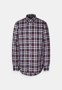 La camicia a quadri presenta una combinazione di colori blu navy, rosso e bianco, colletto con bottoni, maniche lunghe e un orlo curvo. Realizzata in un tessuto dalla superficie liscia.