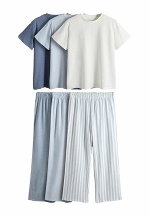 Three short-sleeve T-shirts in dark blue, light blue, and white, paired with three elastic-waist pants in blue tones and stripes.