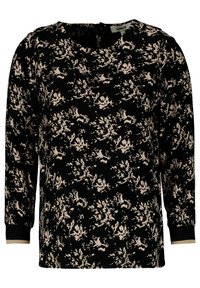 Blusa nera a maniche lunghe con motivo floreale in beige. Il materiale è morbido, con polsini a coste e scollatura arrotondata.