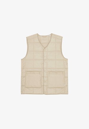 Smėlio spalvos paminkštinta liemenė su V formos iškirpte, priekyje užsegama sagomis ir dvi didelės priekinės kišenės. Medžiaga yra lygi ir su siuvinėjimo raštu.