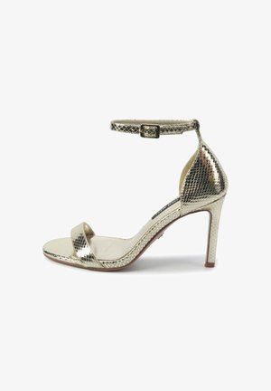 Gold snake-print high-heeled sandal with a thin ankle strap and open toe. Features a smooth footbed and narrow heel.