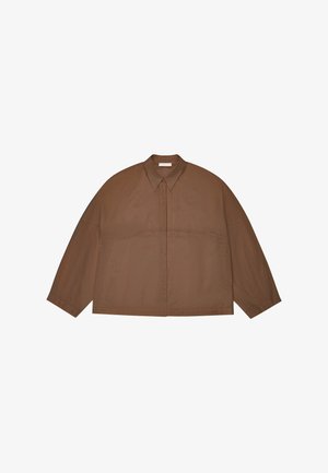 Brown oversized long-sleeve jacket with a pointed collar and concealed front fastening, displayed on a white background.