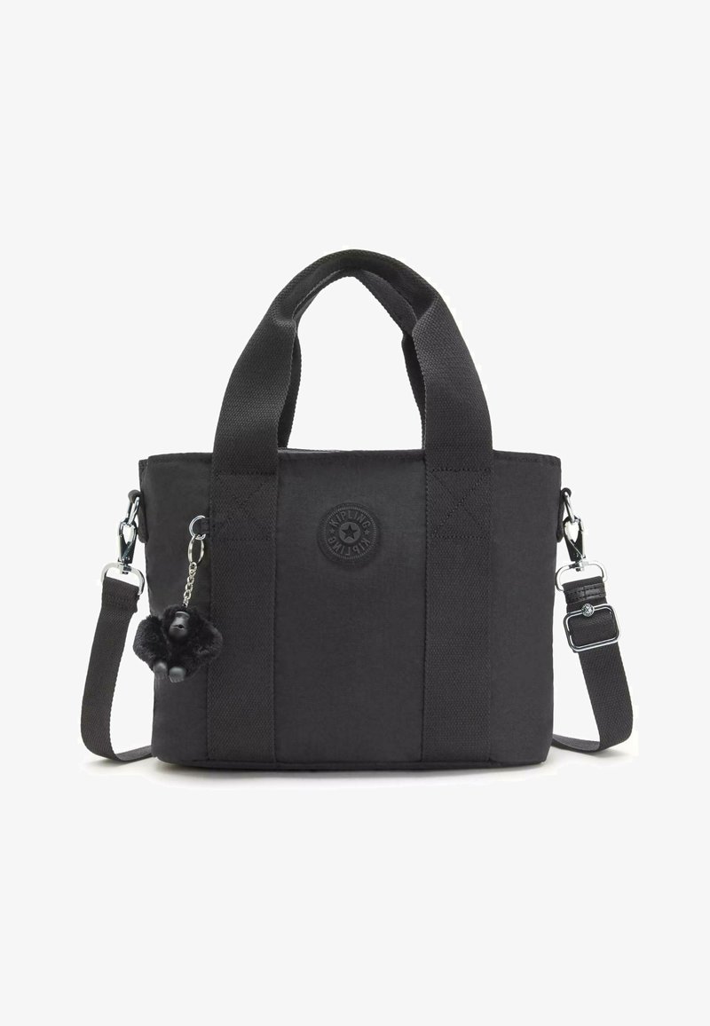 Musta kangas laukku, joka on valmistettu kestävästä kankaasta. Siinä on kaksi yläkahvaa, irrotettava olkahihna ja pörröinen gorillan avaimenperäkoriste.