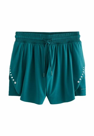 Tyrkysové sportovní šortky vyrobené z měkké tkaniny, s elastickým pasem se šňůrkou, bočními rozparky a dekorativními kruhovými akcenty.
