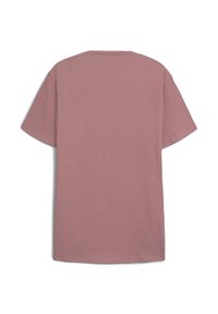 T-shirt dalla vestibilità rilassata in morbido cotone rosa polveroso, con maniche corte e scollo rotondo. Design semplice senza grafica o decorazioni visibili.