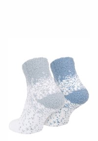 Flauschige Crew-Socken in Weiß und Hellblau mit einem Farbverlauf und strukturiertem Finish. Weiches Material mit geripptem Abschluss.
