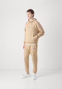 HUGO NAPIN - Tréningruha alsók - medium beige