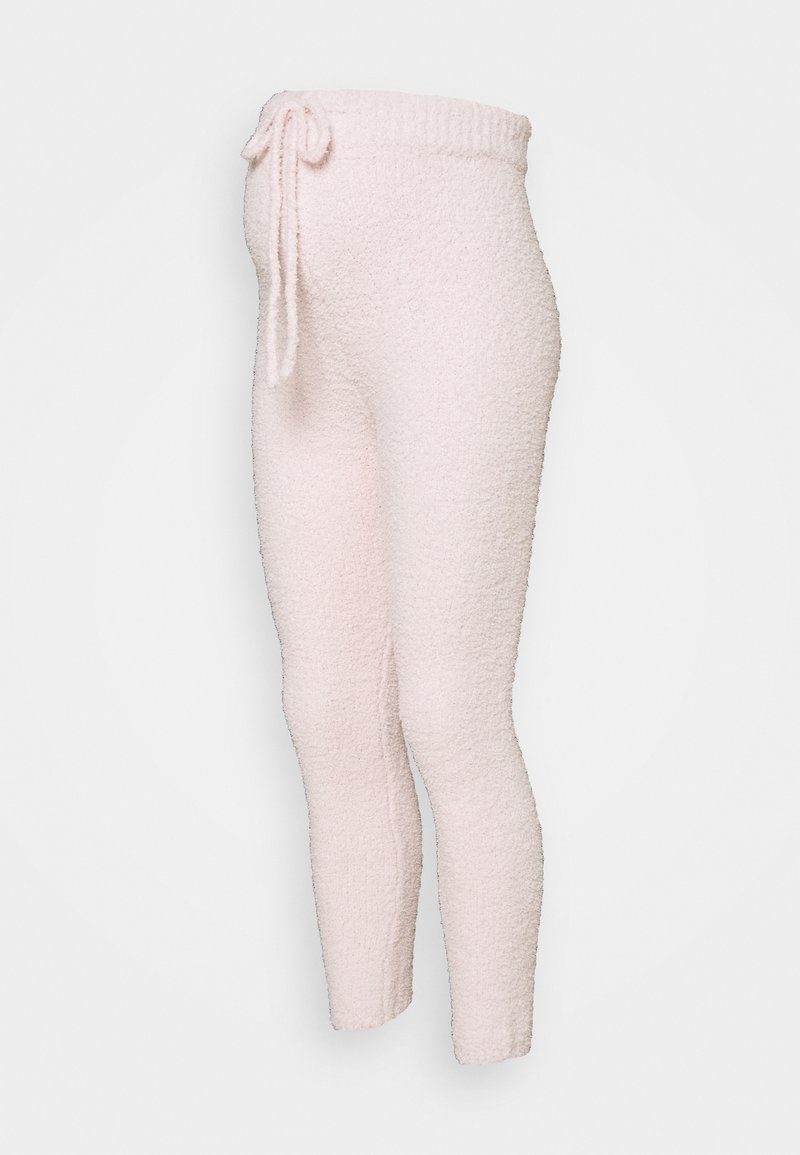 Pantalones tipo jogger de forro polar rosa claro con una superficie texturizada, diseño ajustado y cintura con cordón ajustable. Puños elásticos en los tobillos.