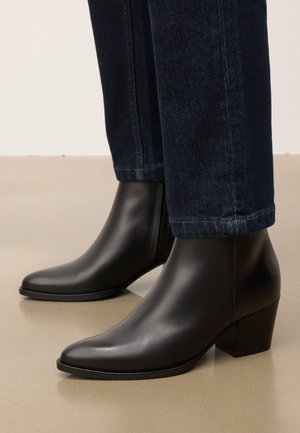 TANGO - Tronchetti - black