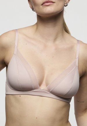Lichtroze bralette met een driehoekige cupvorm, mesh accenten, verstelbare bandjes en een naadloze afwerking. Zachte stof met subtiele textuur.