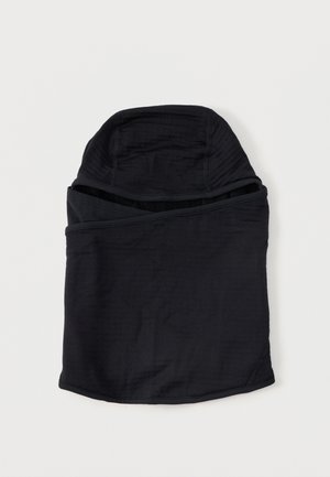 Balaclava noire avec des coutures brodées et une fente pour les yeux, présentée sur un fond blanc.