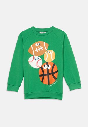 Felpa verde a maniche lunghe con palloni sportivi da cartone animato (calcio, baseball, tennis, basket) con occhi sulla parte anteriore.