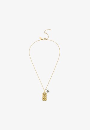Halskette in Goldoptik mit einem rechteckigen Anhänger mit ovalen Ausschnitten und einem kleinen dekorativen Anhänger. Die Kette ist zart und in der Länge verstellbar.