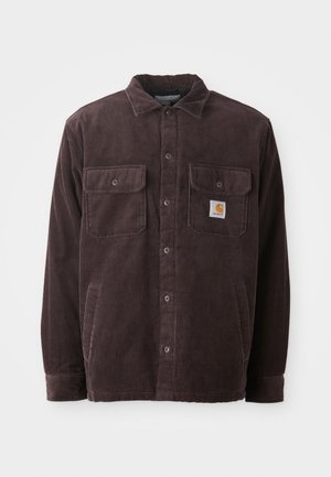 Katoenen shirtjack in donkerpaars met een kraag, een knoopsluiting aan de voorkant, twee borstzakken en een logo patch op de linker zak.