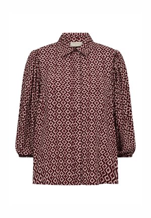 Blouse met lange mouwen en een kraag met een herhalend golvend geometrisch patroon in bordeauxrood en lichtroze.
