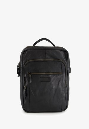 Black leather backpack with a smooth texture, front zip pockets, top handle, and gold-tone hardware details. Features a logo patch.