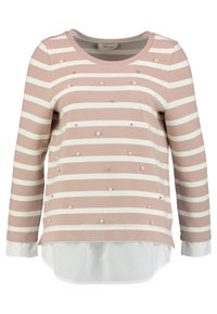 Top à rayures à manches longues en rose clair et blanc, avec des embellissements et un ourlet superposé blanc contrastant en bas.