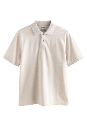 Light beige polo shirt made of soft cotton, featuring a classic collar, two buttons, and a subtle logo on the chest. Short sleeves.