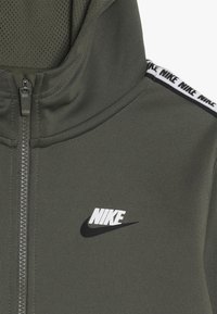 Nike Sportswear HOODIE TAPED - Träningsjacka - medium olive/white