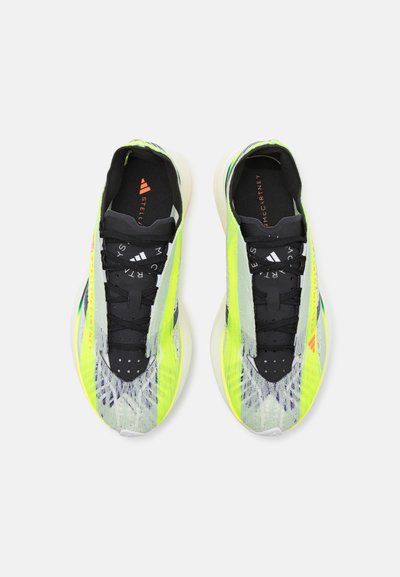 adidas by Stella McCartney PRIME STRUNG - Katujuoksukengät - linen green/collegiate purple/off white