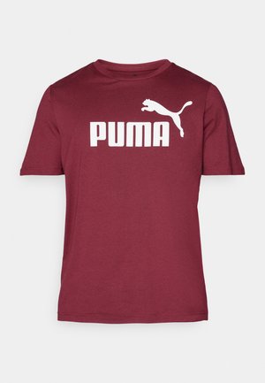 Bordo trumpomis rankovėmis marškiniai, pagaminti iš minkštos medžiagos, su dideliu baltu "PUMA" logotipu ir šokančio pumos grafika priekyje.