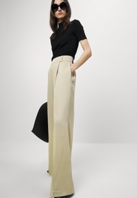 HUGO HANIANA - Παντελόνι - medium beige