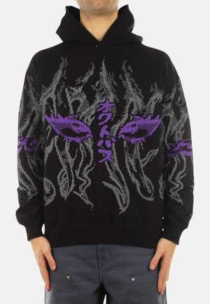 Felpa con cappuccio nera caratterizzata da design pixelati grigi e viola, tra cui occhi stilizzati e testo, con una finitura testurizzata.