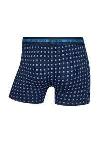 Navy boxer briefs with a geometric light blue square pattern. Elastic waistband labeled "JBS UNDERWEAR." Cotton material, smooth texture.