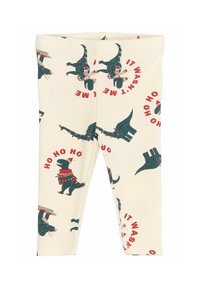 Tejanyagú, krém színű leggings, bordázott textúrával, sötétzöld dinoszauruszos grafikákkal, piros részletekkel és játékos szöveggel.