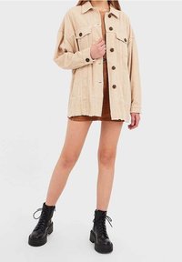 Stradivarius Pitkä takki - light brown