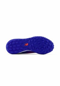 New Balance shoe sole, purple with circular treads, featuring a white and red accent. Textured surface for grip. Lightweight design.