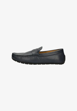Navy blue leather loafer with stitched detailing, rounded toe, and slim black rubber sole. Slip-on design with minimal hardware accents.