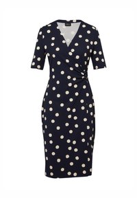 Marineblauwe jurk tot op de knie met witte polka dots, korte mouwen, V-hals en geplooide details aan de rechterkant van de taille.