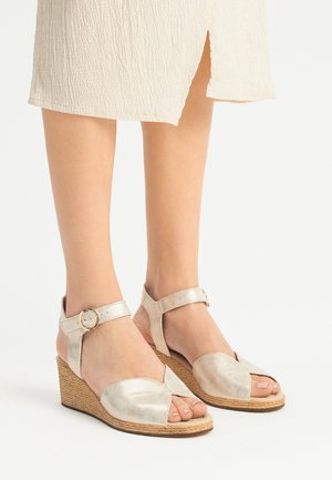 Sandalen met sleehak - platynowy tr