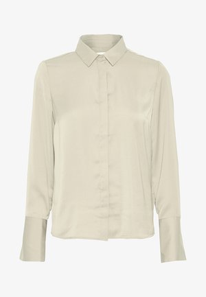 Beige Langarmbluse mit klassischem Kragen, verdeckten Vorderknöpfen und breiten Manschetten.