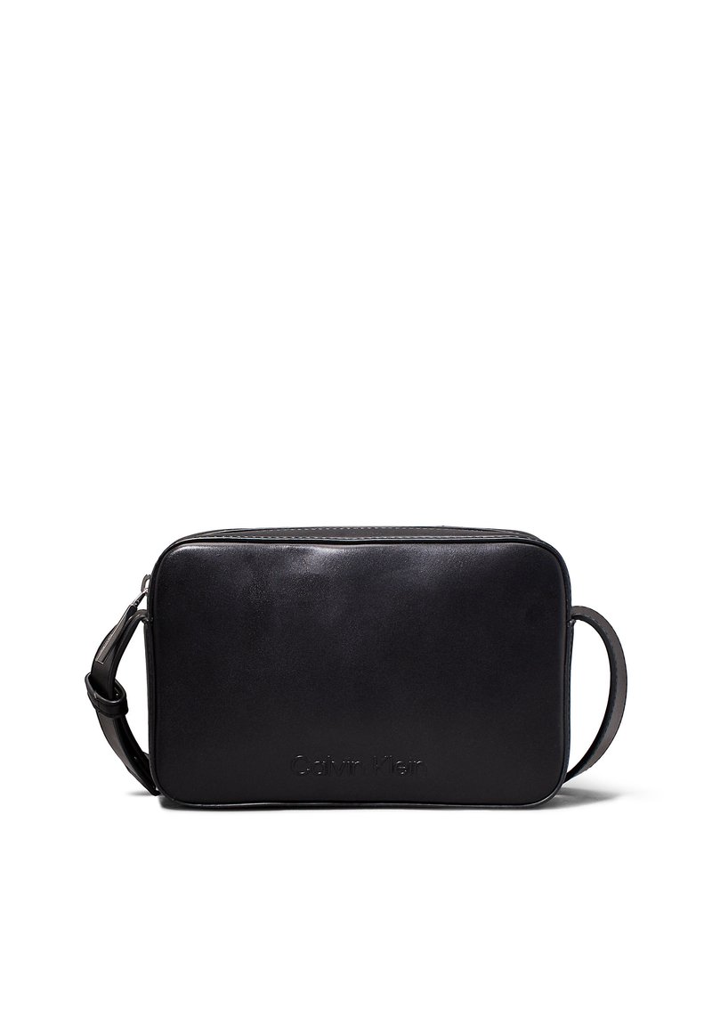 Black leather rectangular bag with a zip closure, featuring a detachable shoulder strap and embossed logo on the front.