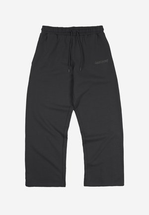 Pantaloni sportivi neri a gamba larga con vita elastica e coulisse, caratterizzati da un logo discreto sulla parte superiore della coscia sinistra.