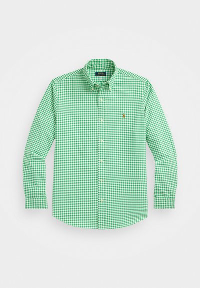 Πράσινο και λευκό καρό πουκάμισο με κουμπιά, μακριά μανίκια, κολάρο, με μικρή κεντημένη λογότυπο στο αριστερό στήθος. Υλικό από βαμβάκι.