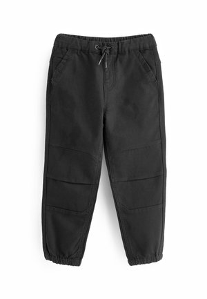 Czarne spodnie dresowe z wytrzymałej tkaniny, z elastycznym pasem i sznurkiem, kieszeniami po bokach oraz zwężanymi mankietami.