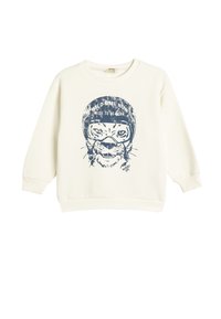 Krämfärgad sweatshirt i mjukt tyg med en blå grafik av en tiger som bär en hjälm, med texten "WILD TIME NOW RIDE TO BE BORN."