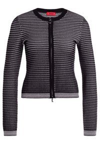 Black and white patterned cardigan with a fitted design, round neckline, and full-length sleeves featuring a front zipper and ribbed hem.