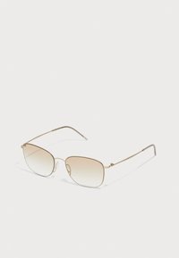 Unselected, matte pale gold-coloured