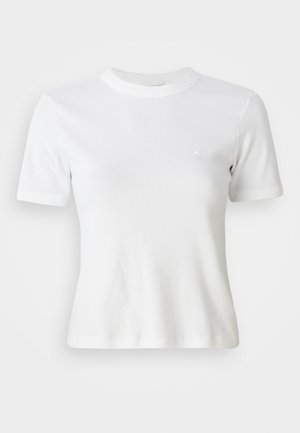 White ribbed short-sleeve t-shirt with a round neckline and a small logo on the chest. Made from soft fabric with a fitted design.