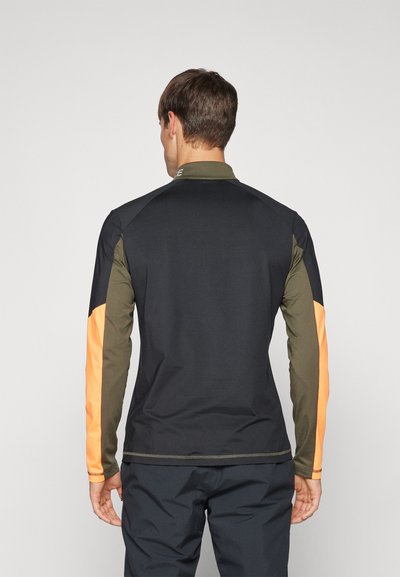 Long-sleeve athletic shirt in black with olive green and orange panels. Features a collar and contrasting stitching on the back and sleeves.