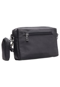 Borsa nera in nylon con un scomparto principale con zip, tasca frontale con zip e una pochette mini staccabile. Texture liscia, forma rettangolare compatta.