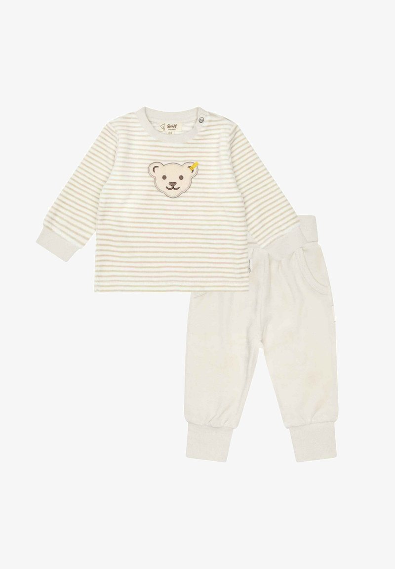 Striped long-sleeve top in light cream with bear applique; paired with soft cream pants featuring elastic cuffs and waistband.